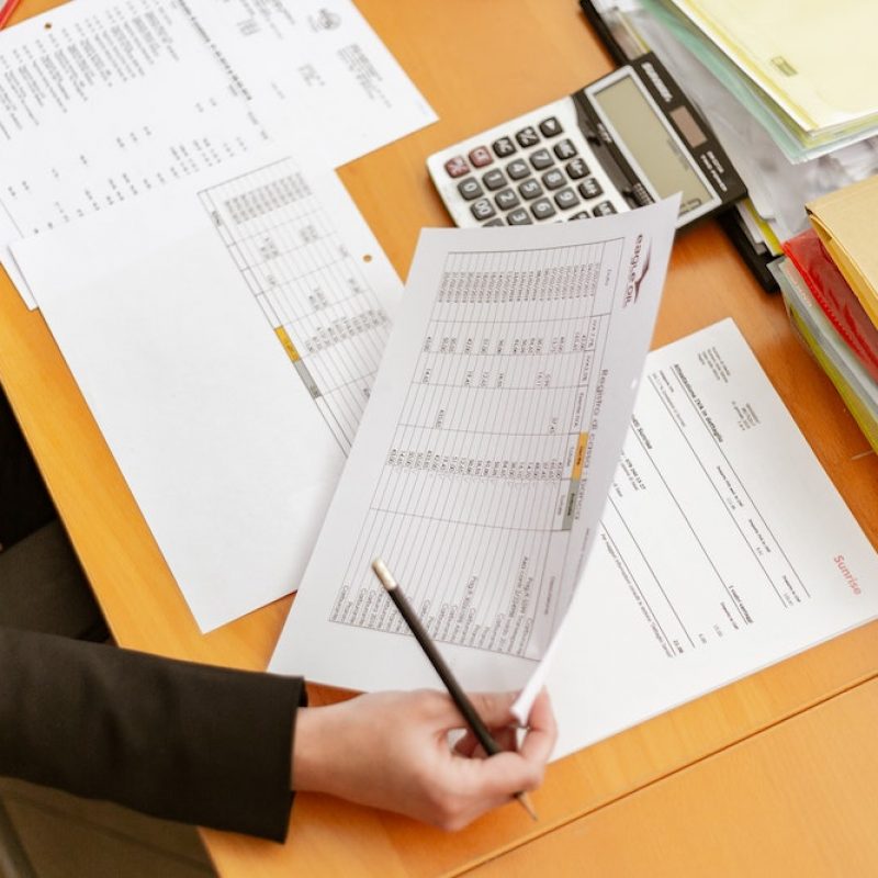 Looking_at_papers_desk